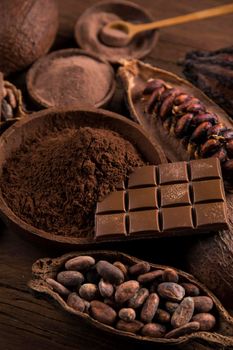 Cocoa pod and chocolate bar and food dessert background