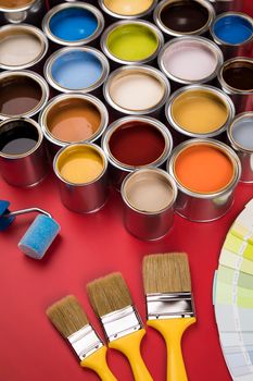 Open paint cans with a brush, Rainbow colors