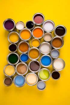 Open buckets with a paint, colors background