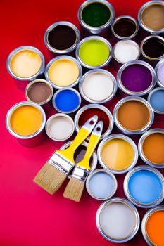 Open paint cans with a brush, Rainbow colors