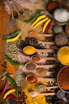 Hot spices in wooden bowls