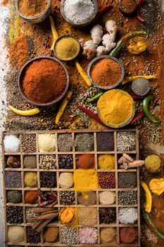 Wooden table of colorful spices