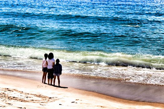 Sesimbra, Lisbon, Portugal- June 1, 2018: Views of the Sesimbra Beach and tourists watching the Atlantic Ocean in a sunny day.