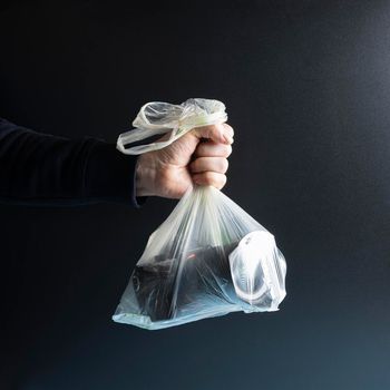 a camera in a clear plastic bag