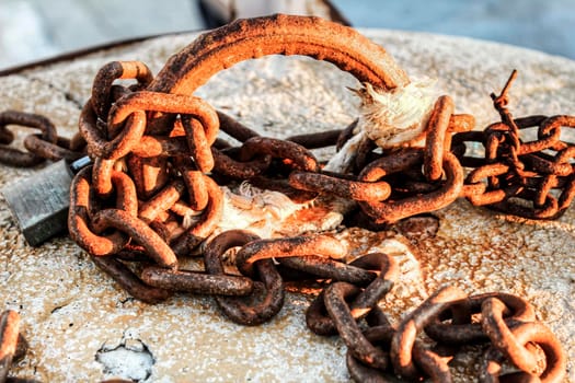Rusty chains in the dock in southern Spain