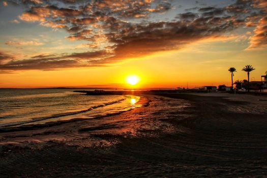 Sunset on the beach in Santa Pola, Alicante, Spain
