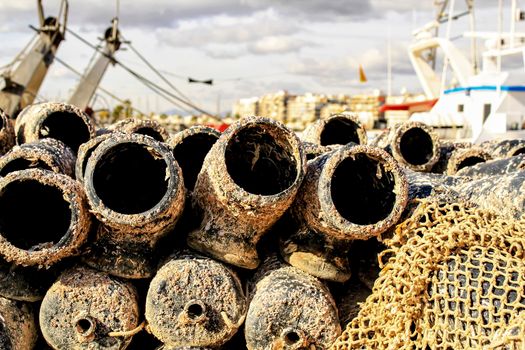 Traps to fish octopus and nets in the pier of Santa Pola, Aicante, Spain