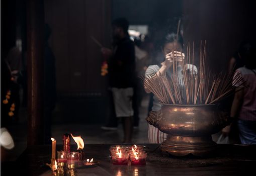 Bangkok, Thailand - 27 Oct 2019 : Interesting Asian women experience Thailand religion culture praying at Dragon Temple Kammalawat (Wat Lengnoeiyi), Wat Leng Noei Yi is the most important Chinese Buddhist temple in Bangkok.