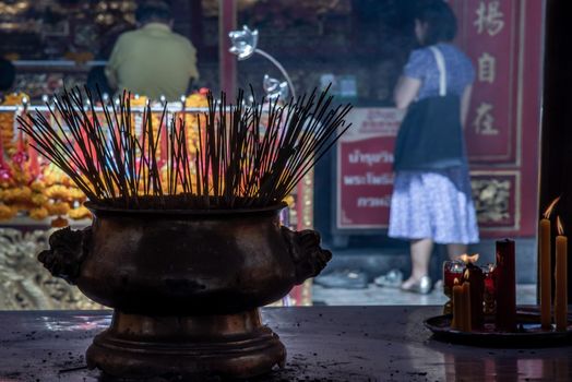 Bangkok, Thailand - 27 Oct 2019 : Incense burning at a temple in Wat Mangkon Kamalawat, Bangkok
