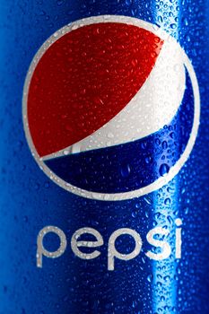 Detail of classic Pepsi can with water droplets on black background. Studio shot in Bucharest, Romania, 2021