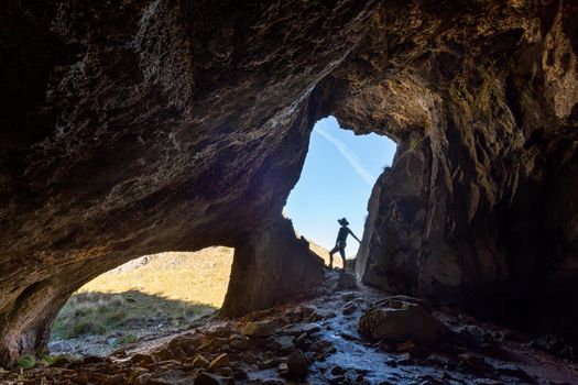 Female hiker exploring caves while on vacation  in NSW Australia