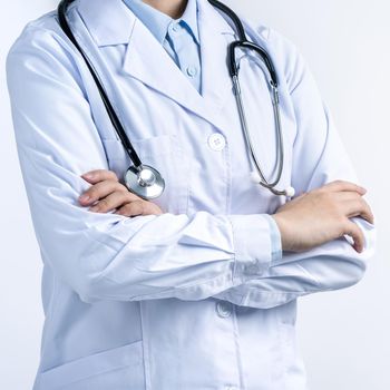 Female doctor body part with hand gesture, young woman physician with stethoscope isolated on white background, close up, cropped view, copy space