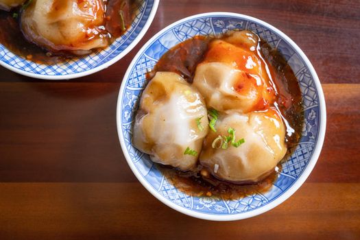 Bawan (Ba wan), Taiwanese meatball delicacy, delicious street food, steamed starch wrapped round shaped dumpling with pork inside, close up, copy space