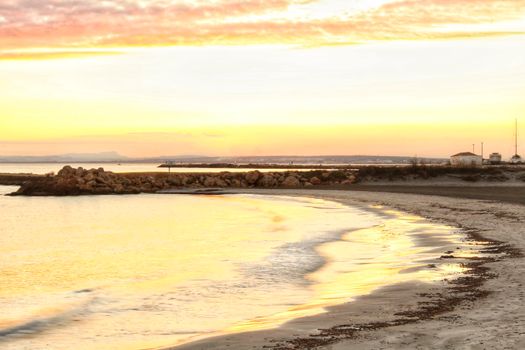 Beautiful Sunset on the beach in Santa Pola, Alicante, Spain