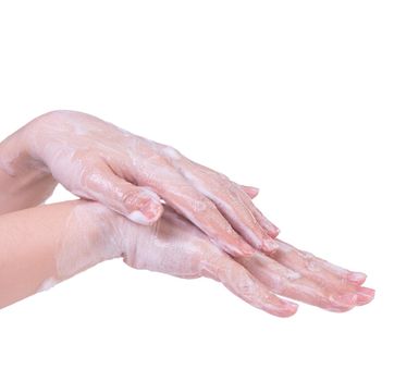 Washing hands isolated on white background. Asian young woman using liquid soap to wash hands, concept of protecting pandemic coronavirus, close up.