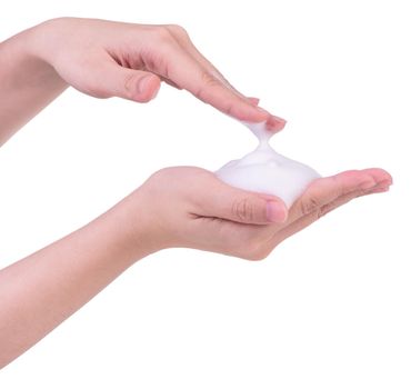 Washing hands isolated on white background. Asian young woman using liquid soap to wash hands, concept of protecting pandemic coronavirus, close up.