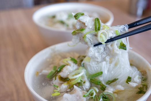 Delicious fish ball rice noodles in thick soup, common food in Tainan, Taiwan, Asia, Asian Taiwanese street delicacy cuisine, close up, lifestyle.
