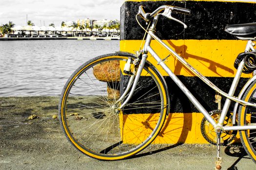 Vintage bicycle by the sea in the dock in Santa Pola, Alicante, Spain