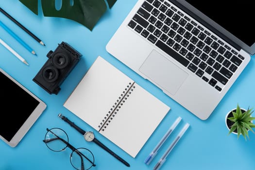 Concept of stylized home office table with fashion accessories, minimal interior, workspace design, close up, flat lay, copy space, top view, mockup