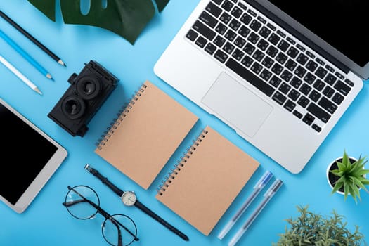 Concept of stylized home office table with fashion accessories, minimal interior, workspace design, close up, flat lay, copy space, top view, mockup