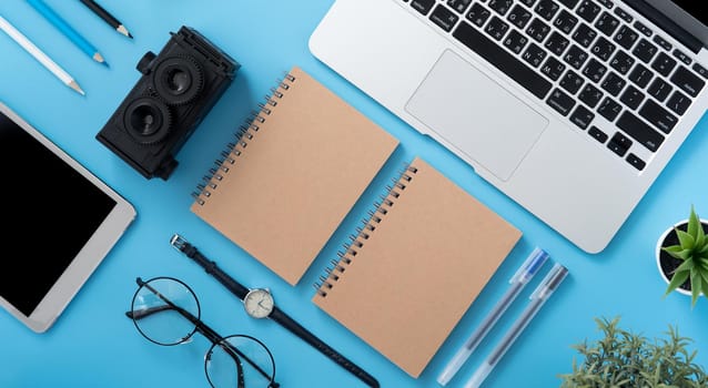 Concept of stylized home office table with fashion accessories, minimal interior, workspace design, close up, flat lay, copy space, top view, mockup