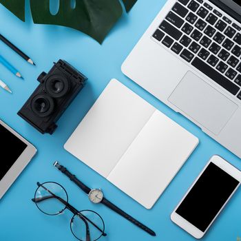 Concept of stylized home office table with fashion accessories, minimal interior, workspace design, close up, flat lay, copy space, top view, mockup