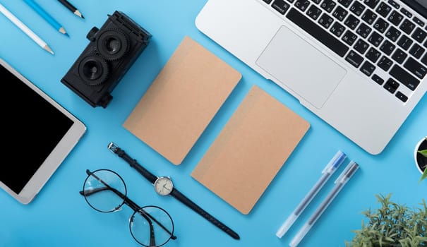 Concept of stylized home office table with fashion accessories, minimal interior, workspace design, close up, flat lay, copy space, top view, mockup