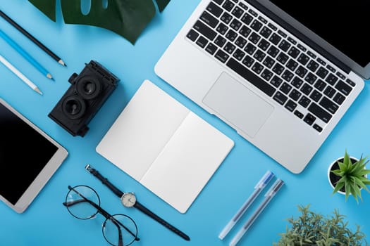 Concept of stylized home office table with fashion accessories, minimal interior, workspace design, close up, flat lay, copy space, top view, mockup