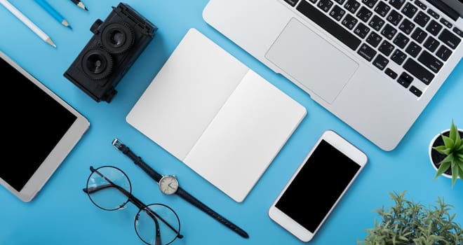 Concept of stylized home office table with fashion accessories, minimal interior, workspace design, close up, flat lay, copy space, top view, mockup