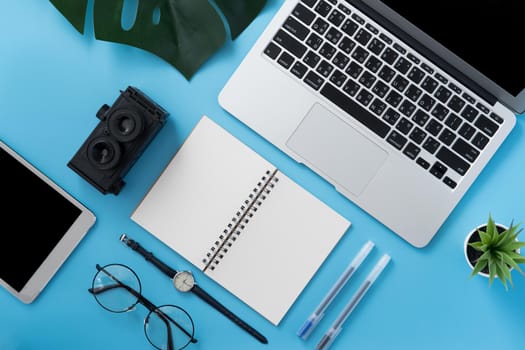 Concept of stylized home office table with fashion accessories, minimal interior, workspace design, close up, flat lay, copy space, top view, mockup