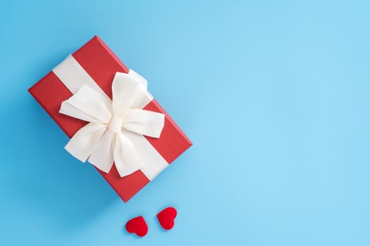 Concept of beautiful Valentine's day, anniversary, mother's day and birthday present and greetings on blue background, copyspace, topview, mockup