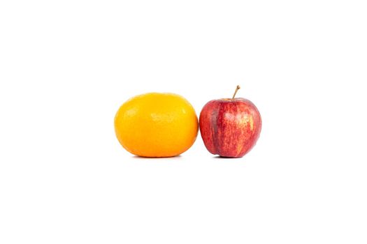 Oranges or tangerine and apple isolated on white background