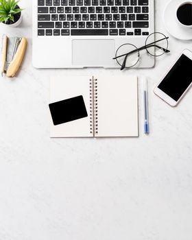 Online purchase concept, mock up credit card with fashion office desk computer isolated on beautiful marble background, workspace design, topview, flatlay, copyspace, closeup