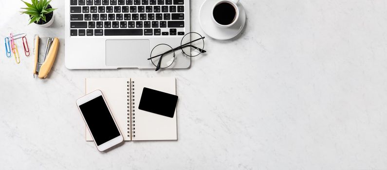 Online purchase concept, mock up credit card with fashion office desk computer isolated on beautiful marble background, workspace design, topview, flatlay, copyspace, closeup