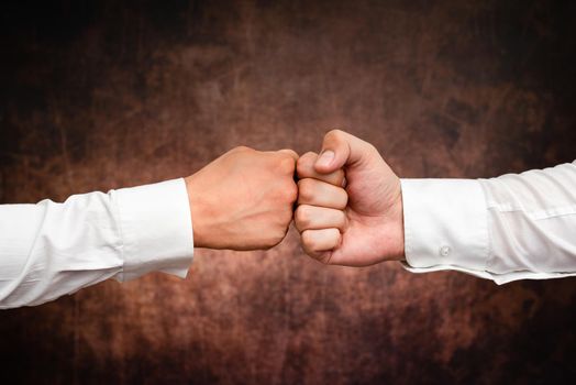 Two Professional Well-Dressed Corporate Businessmen Handshake Indoors