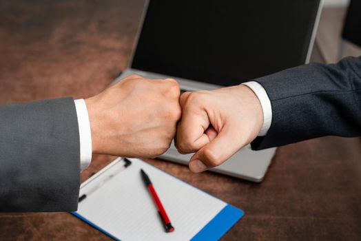 Two Professional Well-Dressed Corporate Businessmen Handshake Indoors