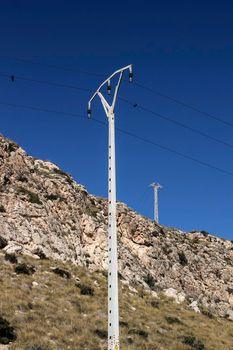 High voltage towers in the mountain