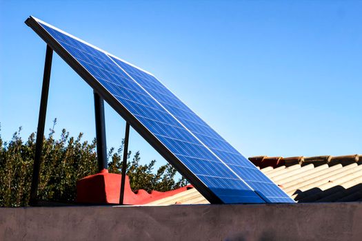 Solar energy plates on the roof at home