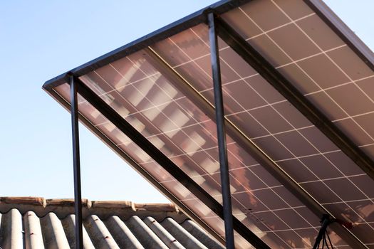 Solar energy plates on the roof at home