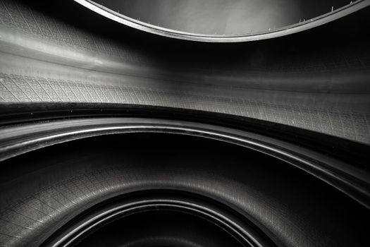 abstract black curved background, inside of car tires