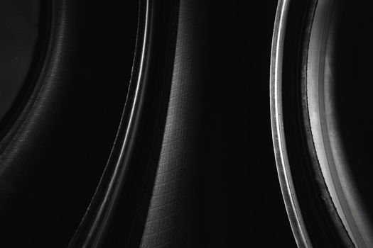 abstract black curved background, inside of car tires
