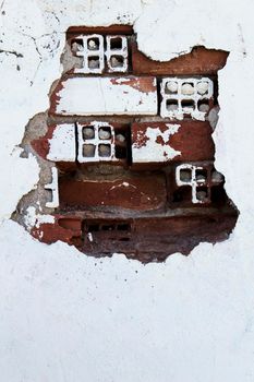 Old and damaged wall texture with windows