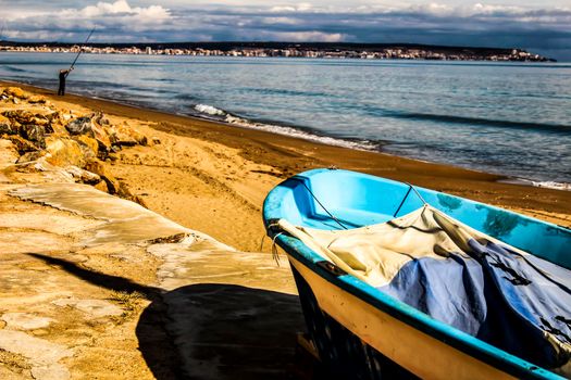 Fishing boats on the shore in the morning