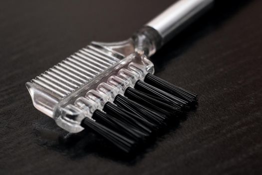 Brush for applying makeup for eyelashes close up, macro photo