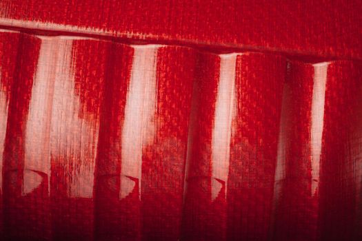 red shell carbon fiber texture, closeup view