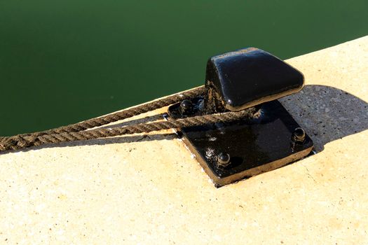 Mooring bollard post at the dock in Santa Pola, Alicante
