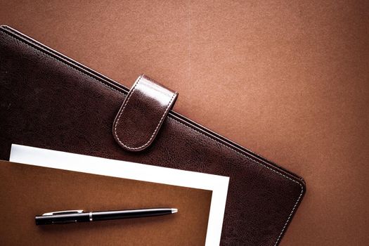 Productivity, work and corporate lifestyle concept - Vintage business briefcase on the office table desk, flatlay background