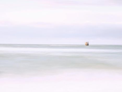 Summer sunset on the Gulf, long exposure of calm ocean
