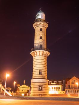 November 2016. Warnemunde town with Lighthouse Germany. The old lighthouse and stony square  above emerald waters of harbor