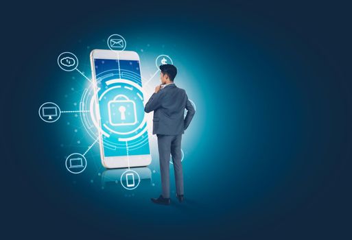 Businessman standing while cyber security with smart phone, access data and privacy with protection digital with smartphone, innovation of system protect with mobile, business futuristic concept.